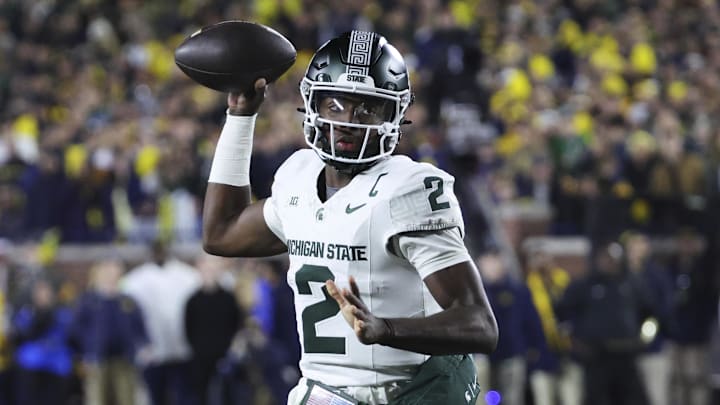 Oct 26, 2024; Ann Arbor, Michigan, USA; Michigan State Spartans quarterback Aidan Chiles (2) passes in the first half against the Michigan Wolverines at Michigan Stadium. Mandatory Credit: Rick Osentoski-Imagn Images Oct 26, 2024; Ann Arbor, Michigan, USA; Michigan State Spartans quarterback Aidan Chiles (2) passes in the first half against the Michigan Wolverines at Michigan Stadium. Mandatory Credit: Rick Osentoski-Imagn Images