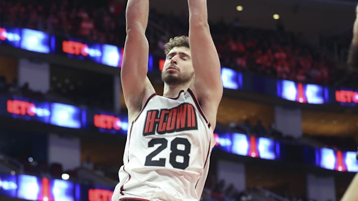 Mar 12, 2025; Houston, Texas, USA; Houston Rockets center Alperen Sengun (28) dunks the ball during the fourth quarter against the Phoenix Suns at Toyota Center. Mandatory Credit: Troy Taormina-Imagn Images