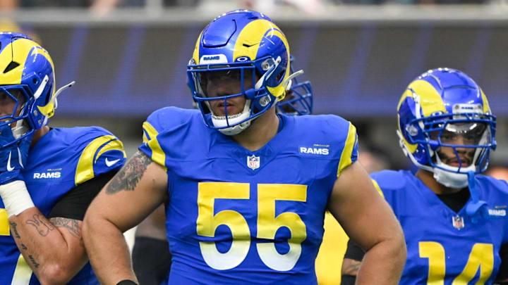 Oct 6, 2024; Inglewood, California, USA; Los Angeles Rams defensive tackle Kobie Turner (91),  linebacker Michael Hoecht (97), defensive tackle Braden Fiske (55) and cornerback Cobie Durant (14) during the second half against the Green Bay Packers at SoFi Stadium. Mandatory Credit: Robert Hanashiro-Imagn Images