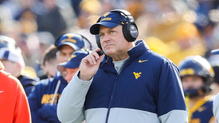 Nov 29, 2025; Morgantown, West Virginia, USA; West Virginia Mountaineers head coach Rich Rodriguez along the sidelines during the first quarter against the Texas Tech Red Raiders at Milan Puskar Stadium. Mandatory Credit: Ben Queen-Imagn Images