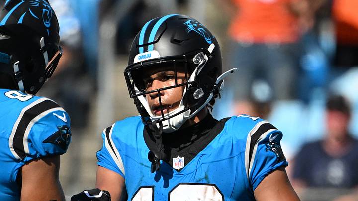 Sep 13, 2026; Charlotte, North Carolina, USA; Carolina Panthers wide receiver Jalen Coker (18) celebrates with tight end Tommy Tremble (82) after scoring a touchdown in the fourth quarter at Bank of America Stadium. Mandatory Credit: Bob Donnan-Imagn Images Sep 13, 2026; Charlotte, North Carolina, USA; Carolina Panthers wide receiver Jalen Coker (18) celebrates with tight end Tommy Tremble (82) after scoring a touchdown in the fourth quarter at Bank of America Stadium. Mandatory Credit: Bob Donnan-Imagn Images