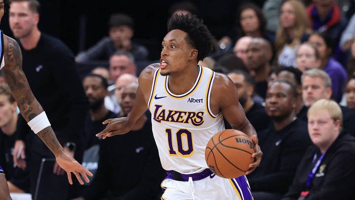 Oct 25, 2026; Salt Lake City, Utah, USA;  Los Angeles Lakers guard Collin Sexton (10) dribbles the ball against Utah Jazz guard Darryn Peterson (22) during the second half at Delta Center.  Mandatory Credit: Rob Gray-Imagn Images