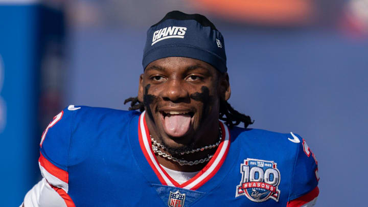 New York Giants cornerback Deonte Banks runs out of the tunnel.
