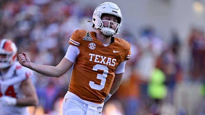 Dec 21, 2024; Austin, Texas, USA; Texas Longhorns quarterback Quinn Ewers (3) celebrates after he throws a touchdown pass against the Clemson Tigers during the second quarter of the CFP National Playoff first round game at Darrell K Royal-Texas Memorial Stadium. Mandatory Credit: Jerome Miron-Imagn Images