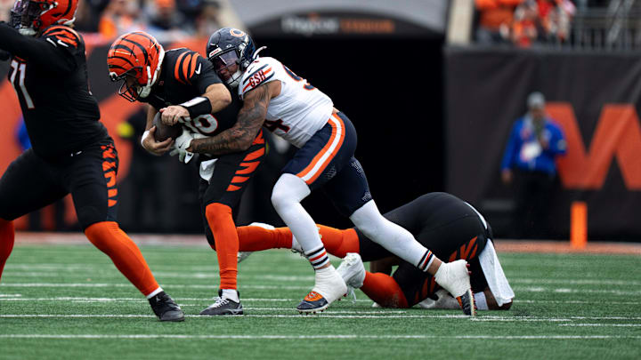 Chicago Bears defensive lineman Austin Booker (94) forces Cincinnati Bengals quarterback Joe Flacco (16) to fumble in the fourth quarter of the NFL football game between Chicago Bears and Cincinnati Bengals at Paycor Stadium in Cincinnati on Nov. 2, 2025.