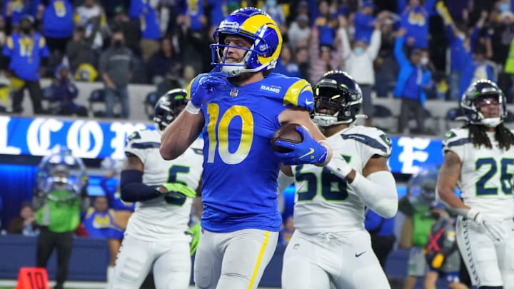 Dec 21, 2021; Inglewood, California, USA; Los Angeles Rams wide receiver Cooper Kupp (10) celebrates after scoring on a 29-yard touchdown reception against the Seattle Seahawks in the second half at SoFi Stadium. The Rams defeated the Seahawks 20-10. Mandatory Credit: Kirby Lee-Imagn Images