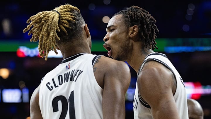 Dec 23, 2025; Philadelphia, Pennsylvania, USA; Brooklyn Nets center Nic Claxton (33) reacts with forward Noah Clowney (21) after a defensive stop against the Philadelphia 76ers during the fourth quarter at Xfinity Mobile Arena. Mandatory Credit: Bill Streicher-Imagn Images