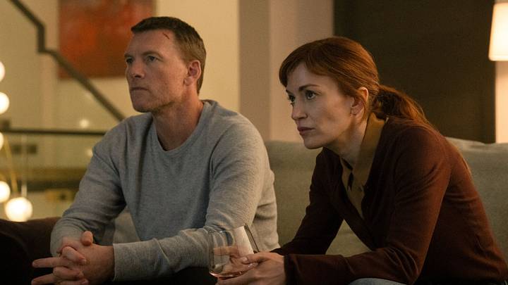 I Will Find You. (L to R) Sam Worthington as David Burroughs and Britt Lower as Rachel Mills in Episode #102 of I Will Find You. Cr. Christos Kalohoridis/NETFLIX © 2025 I Will Find You. (L to R) Sam Worthington as David Burroughs and Britt Lower as Rachel Mills in Episode #102 of I Will Find You. Cr. Christos Kalohoridis/NETFLIX © 2025