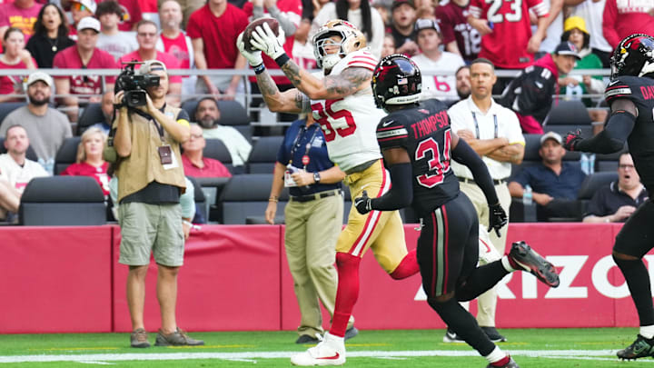 Nov 16, 2025; Glendale, Arizona, USA; San Francisco 49ers tight end George Kittle (85) catches a pass for a touchdown in the first quarter against the Arizona Cardinals at State Farm Stadium. Mandatory Credit: Joe Camporeale-Imagn Images