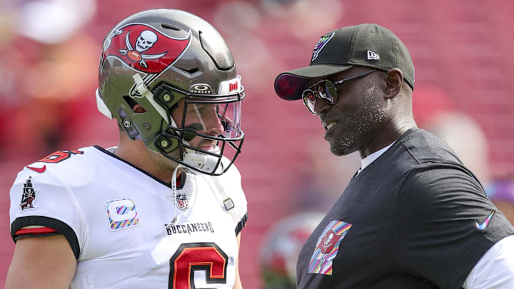 Oct 22, 2023; Tampa, Florida, USA;  Tampa Bay Buccaneers quarterback Baker Mayfield (6) speaks to head coach Todd Bowles before a game against the Atlanta Falcons at Raymond James Stadium. Mandatory Credit: Nathan Ray Seebeck-Imagn Images
