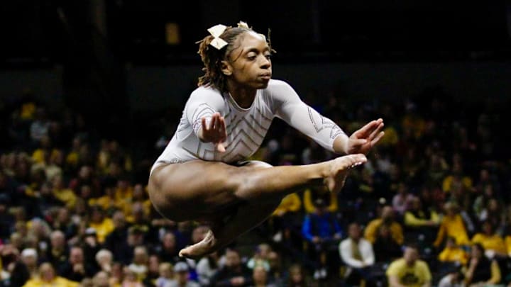 Friday, Jan. 16, 2026; Hannah Horton leaps in the air during her floor routine. Horton scored a 9.925 for tie for the floor crown. Friday, Jan. 16, 2026; Hannah Horton leaps in the air during her floor routine. Horton scored a 9.925 for tie for the floor crown.