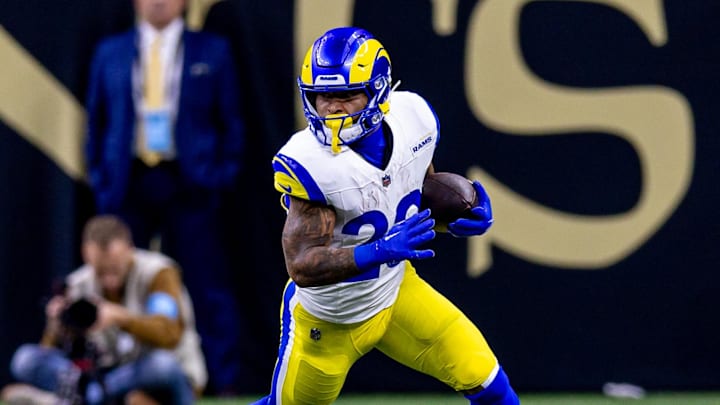 Dec 1, 2024; New Orleans, Louisiana, USA;  Los Angeles Rams running back Kyren Williams (23) rushes against the New Orleans Saints during the first half at Caesars Superdome. Mandatory Credit: Stephen Lew-Imagn Images