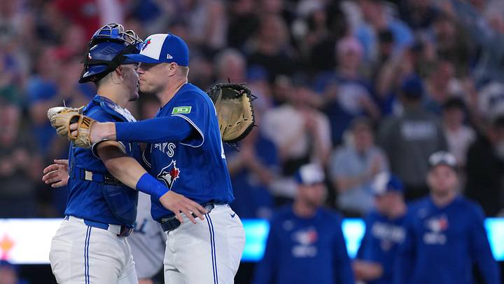 Toronto Blue Jays catcher Brandon Valenzuela (59) celebrates the win with relief pitcher Tanner Andrews (43) against the Miami Marlins at the end of the ninth inning at the Rogers Centre on May 26. Toronto Blue Jays catcher Brandon Valenzuela (59) celebrates the win with relief pitcher Tanner Andrews (43) against the Miami Marlins at the end of the ninth inning at the Rogers Centre on May 26.