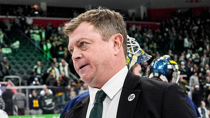 Michigan head coach Brandon Naurato, left, shakes hands with Michigan State head coach Adam Nightingale after 5-2 loss at the Duel in the D at Little Caesars Arena in Detroit on Saturday, February 7, 2026. Michigan head coach Brandon Naurato, left, shakes hands with Michigan State head coach Adam Nightingale after 5-2 loss at the Duel in the D at Little Caesars Arena in Detroit on Saturday, February 7, 2026.