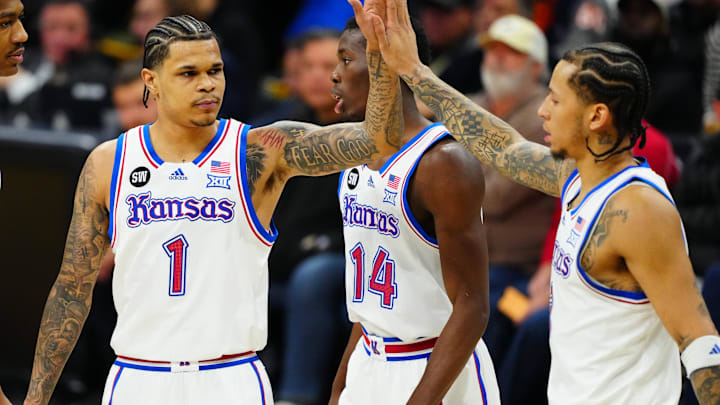 Jan 20, 2026; Boulder, Colorado, USA; Kansas Jayhawks guard Tre White (3),guard Melvin Council Jr. (14),Kansas Jayhawks guard Jayden Dawson (1) and forward Bryson Tiller (15) react in the first half against the Colorado Buffaloes at the CU Events Center. Mandatory Credit: Ron Chenoy-Imagn Images Jan 20, 2026; Boulder, Colorado, USA; Kansas Jayhawks guard Tre White (3),guard Melvin Council Jr. (14),Kansas Jayhawks guard Jayden Dawson (1) and forward Bryson Tiller (15) react in the first half against the Colorado Buffaloes at the CU Events Center. Mandatory Credit: Ron Chenoy-Imagn Images