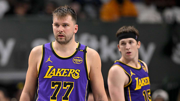 Apr 9, 2025; Dallas, Texas, USA; Los Angeles Lakers guard Luka Doncic (77) and guard Austin Reaves (15) during the game between the Dallas Mavericks and the Los Angeles Lakers at American Airlines Center. Mandatory Credit: Jerome Miron-Imagn Images