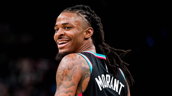 Dec 12, 2025; Memphis, Tennessee, USA; Memphis Grizzlies point guard Ja Morant (12) smiles at the Utah Jazz bench after forcing a turnover in the second half at FedExForum. Mandatory Credit: Matthew Smith-Imagn Images Dec 12, 2025; Memphis, Tennessee, USA; Memphis Grizzlies point guard Ja Morant (12) smiles at the Utah Jazz bench after forcing a turnover in the second half at FedExForum. Mandatory Credit: Matthew Smith-Imagn Images