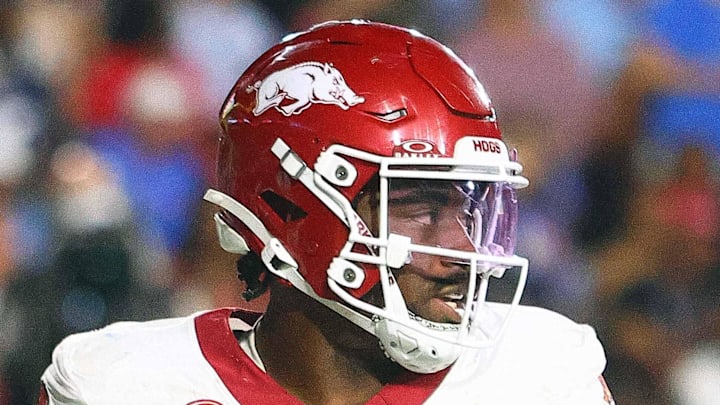 Sep 13, 2025; Oxford, Mississippi, USA; Arkansas Razorback running back Mike Washington Jr. (4) reacts after a touchdown during the fourth quarter against the Mississippi Rebels at Vaught-Hemingway Stadium. Mandatory Credit: Petre Thomas-Imagn Images