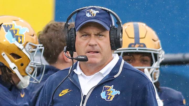 Sep 27, 2025; Morgantown, West Virginia, USA; West Virginia Mountaineers head coach Rich Rodriguez watches a play during the first quarter against the Utah Utes at Milan Puskar Stadium. Mandatory Credit: Ben Queen-Imagn Images Sep 27, 2025; Morgantown, West Virginia, USA; West Virginia Mountaineers head coach Rich Rodriguez watches a play during the first quarter against the Utah Utes at Milan Puskar Stadium. Mandatory Credit: Ben Queen-Imagn Images