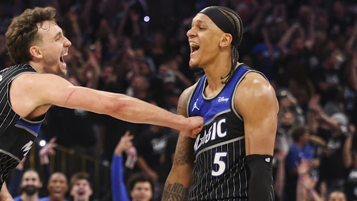 Apr 25, 2026; Orlando, Florida, USA; Orlando Magic forward Franz Wagner (22) reacts to a shot by forward Paolo Banchero (5) against the Detroit Pistons in the fourth quarter during game three of the first round of the 2026 NBA Playoffs at Kia Center. Mandatory Credit: Nathan Ray Seebeck-Imagn Images