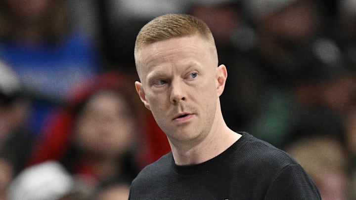 Feb 5, 2026; Dallas, Texas, USA; San Antonio Spurs associate coach Sean Sweeney looks on during the second half against the Dallas Mavericks at the American Airlines Center. Mandatory Credit: Jerome Miron-Imagn Images