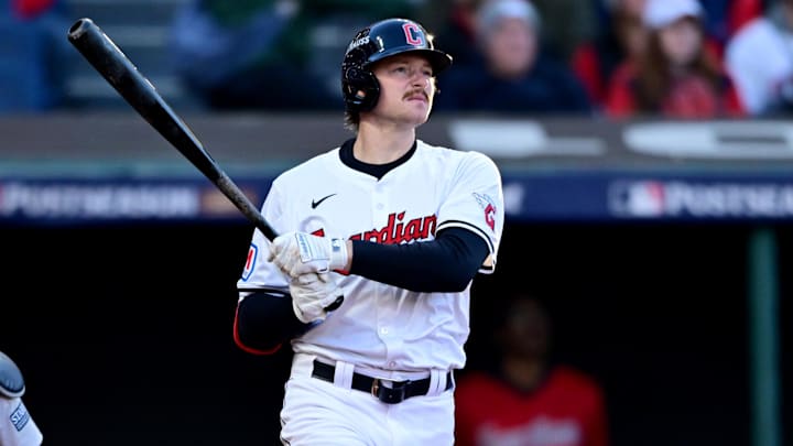 Oct 17, 2024; Cleveland, Ohio, USA; Cleveland Guardians first baseman Kyle Manzardo (9) hits a two-run home run during the third inning against the New York Yankees in game 3 of the American League Championship Series at Progressive Field. Mandatory Credit: David Dermer-Imagn Images