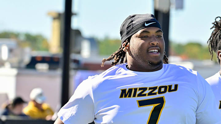 Oct 12, 2024; Amherst, Massachusetts, USA; Missouri Tigers defensive tackle Chris McClellan (7) warms up before a game against the Massachusetts Minutemen at Warren McGuirk Alumni Stadium. Mandatory Credit: Eric Canha-Imagn Images Oct 12, 2024; Amherst, Massachusetts, USA; Missouri Tigers defensive tackle Chris McClellan (7) warms up before a game against the Massachusetts Minutemen at Warren McGuirk Alumni Stadium. Mandatory Credit: Eric Canha-Imagn Images