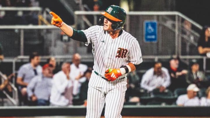 Miami cather Alex Sosa smashing a homerun against lehigh during opening weekend