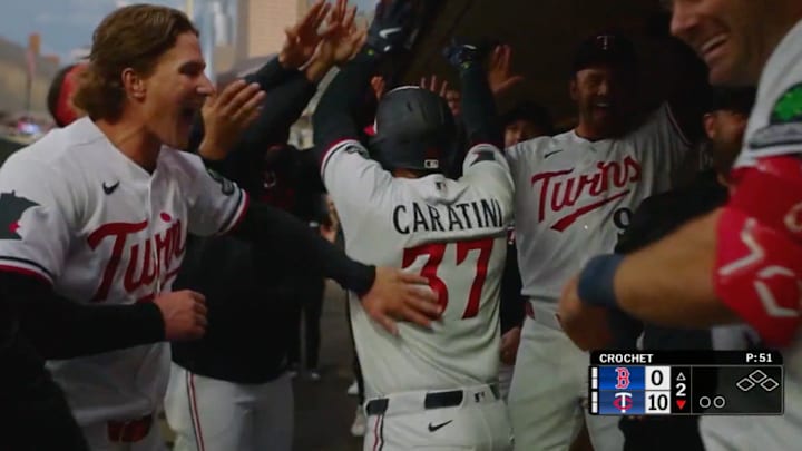 Victor Caratini celebrates in the dugout after hitting a three-run homer off of Garrett Crochet. 