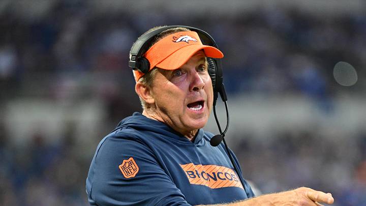 Aug 11, 2024; Indianapolis, Indiana, USA; Denver Broncos Head Coach Sean Payton shares a word with a referee during the second half against the Indianapolis Colts  at Lucas Oil Stadium. Mandatory Credit: Marc Lebryk-Imagn Images