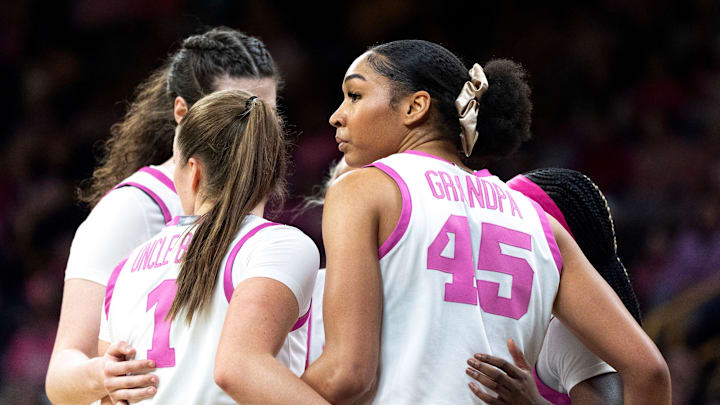 Iowa forward Hannah Stuelke (45) huddles with her teammate during a basketball game against the Washington Huskies Feb. 11, 2026 at Carver-Hawkeye Arena in Iowa City, Iowa. Iowa forward Hannah Stuelke (45) huddles with her teammate during a basketball game against the Washington Huskies Feb. 11, 2026 at Carver-Hawkeye Arena in Iowa City, Iowa.