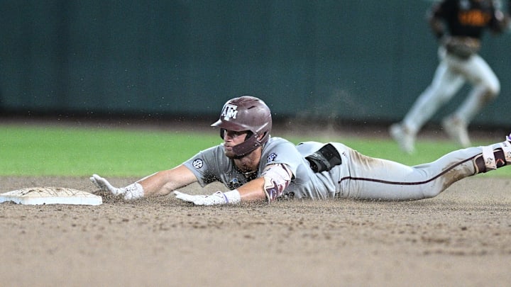 Texas A&M Aggies first baseman Gavin Grahovac (9) slides into second base. 