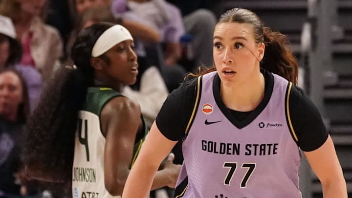Golden State Valkyries forward Marta Suarez (77) and Seattle Storm guard Flau'jae Johnson