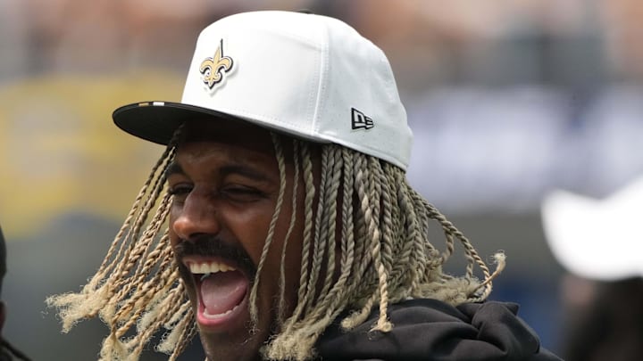 Aug 10, 2025; Inglewood, California, USA; New Orleans Saints defensive end Cameron Jordan (94) talks with cornerback Kool-Aid McKinstry (4) against the Los Angeles Chargers in the first half at SoFi Stadium. Mandatory Credit: Kirby Lee-Imagn Images