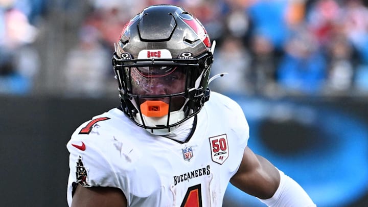 Dec 21, 2025; Charlotte, North Carolina, USA; Tampa Bay Buccaneers running back Rachaad White (1) with the ball in the third quarter at Bank of America Stadium. Mandatory Credit: Bob Donnan-Imagn Images