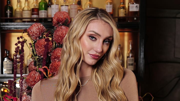 Cam Brink attends the Urban Decay x Cam Brink Face Bond Luminizer launch event