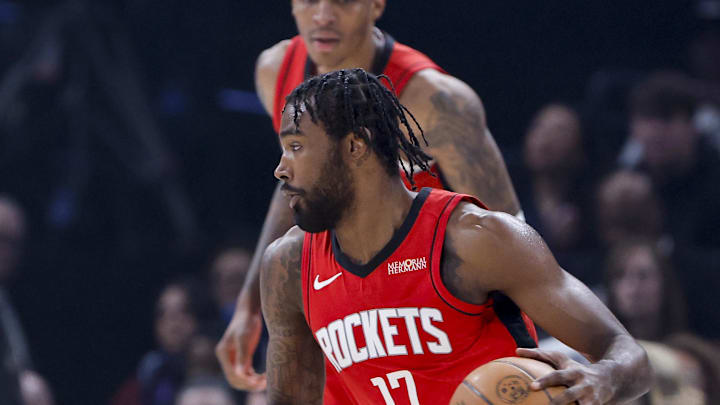 Feb 7, 2026; Oklahoma City, Oklahoma, USA; Houston Rockets forward Tari Eason (17) drives to the basket against Oklahoma City Thunder guard Cason Wallace (22) during the first half at Paycom Center. Mandatory Credit: Alonzo Adams-Imagn Images