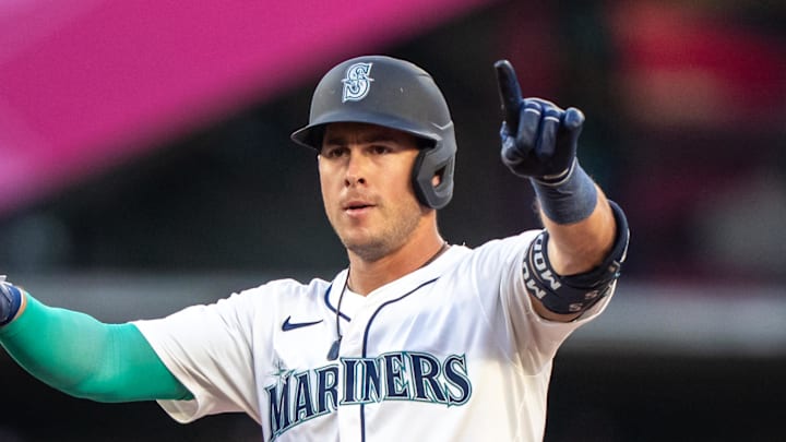 Seattle Mariners second baseman Dylan Moore (25) celebrates at second base after hitting a double during the sixth inning against the Washington Nationals at T-Mobile Park on May 27. 
