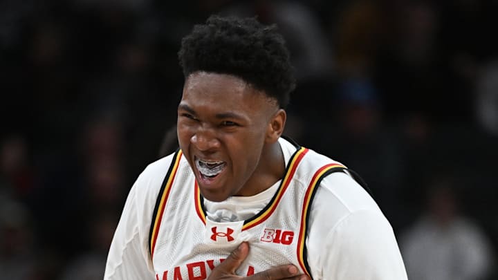 Mar 15, 2025; Indianapolis, IN, USA; Maryland Terrapins center Derik Queen (25) celebrates after a play during the second half against the Michigan Wolverines at Gainbridge Fieldhouse. Mandatory Credit: Robert Goddin-Imagn Images