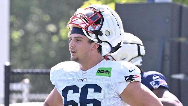 Jul 28, 2025; Foxborough, MA, USA; New England Patriots offensive tackle Will Campbell (66) takes a break during warm-ups  at training camp at Gillette Stadium. Mandatory Credit: Eric Canha-Imagn Images