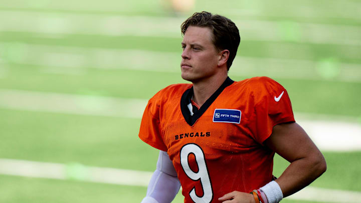 Cincinnati Bengals quarterback Joe Burrow (9) runs onto the field during Bengals Camp practice at Paycor Stadium in Cincinnati on Aug. 2, 2025. Cincinnati Bengals quarterback Joe Burrow (9) runs onto the field during Bengals Camp practice at Paycor Stadium in Cincinnati on Aug. 2, 2025.