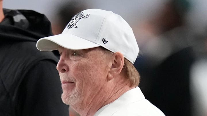 Jan 19, 2026; Miami Gardens, FL, USA; Las Vegas Raiders general manager John Spytek  and owner Mark Davis look on from the sideline before the CFP National Championship college football game between the Indiana Hoosiers and the Miami Hurricanes at Hard Rock Stadium. Mandatory Credit: Kirby Lee-Imagn Images