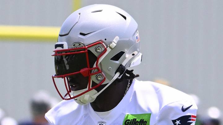 Jun 2, 2026; Foxborough, MA, USA; New England Patriots wide receiver Kyle Williams (18) tracks the ball while being covered by  wide receiver A.J. Brown (1) during the team's OTA at Gillette Stadium. Mandatory Credit: Eric Canha-Imagn Images