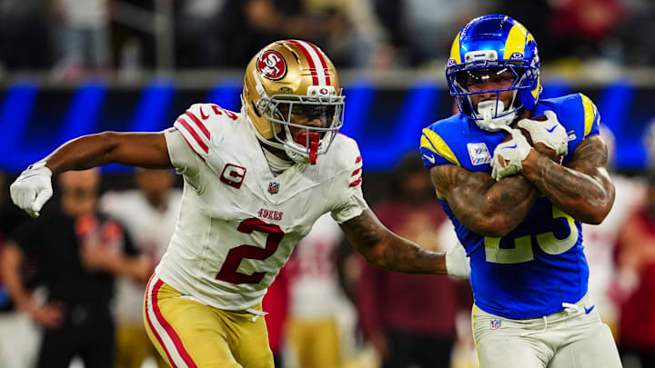 San Francisco 49ers cornerback Deommodore Lenoir (L) and Los Angeles Rams running back Kyren Williams (R) San Francisco 49ers cornerback Deommodore Lenoir (L) and Los Angeles Rams running back Kyren Williams (R)