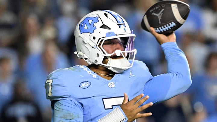 Nov 8, 2025; Chapel Hill, North Carolina, USA; North Carolina Tar Heels quarterback Gio Lopez (7) looks to pass in the second quarter at Kenan Stadium. Mandatory Credit: Bob Donnan-Imagn Images Nov 8, 2025; Chapel Hill, North Carolina, USA; North Carolina Tar Heels quarterback Gio Lopez (7) looks to pass in the second quarter at Kenan Stadium. Mandatory Credit: Bob Donnan-Imagn Images