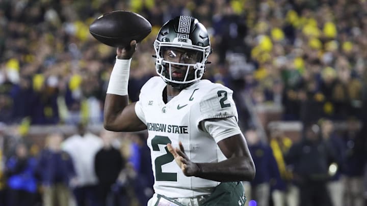 Oct 26, 2024; Ann Arbor, Michigan, USA; Michigan State Spartans quarterback Aidan Chiles (2) passes in the first half against the Michigan Wolverines at Michigan Stadium. Mandatory Credit: Rick Osentoski-Imagn Images Oct 26, 2024; Ann Arbor, Michigan, USA; Michigan State Spartans quarterback Aidan Chiles (2) passes in the first half against the Michigan Wolverines at Michigan Stadium. Mandatory Credit: Rick Osentoski-Imagn Images