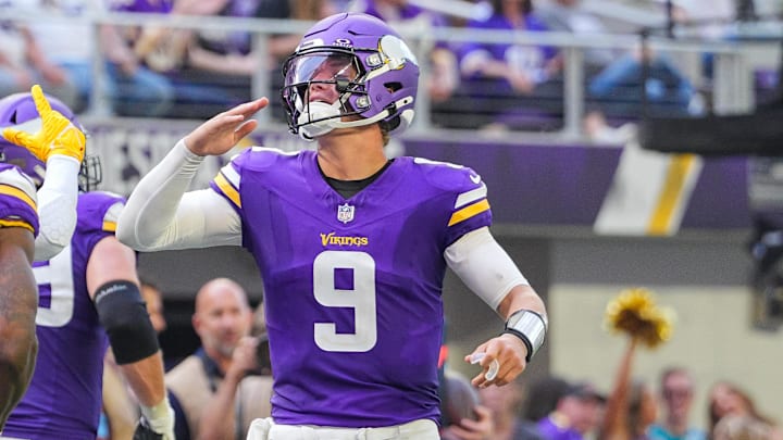 Aug 10, 2024; Minneapolis, Minnesota, USA; Minnesota Vikings quarterback J.J. McCarthy (9) celebrates wide receiver Trent Sherfield Sr. (11) touchdown against the Las Vegas Raiders in the third quarter at U.S. Bank Stadium. Mandatory Credit: Brad Rempel-Imagn Images