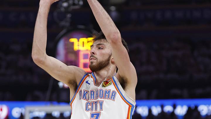May 26, 2026; Oklahoma City, Oklahoma, USA; Oklahoma City Thunder center Chet Holmgren (7) shoots against San Antonio Spurs forward Keldon Johnson (3) during the third quarter in game five of the western conference finals for the 2026 NBA playoffs at Paycom Center. Mandatory Credit: Alonzo Adams-Imagn Images
