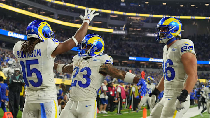 Oct 24, 2024; Inglewood, California, USA; Los Angeles Rams wide receiver Demarcus Robinson (15), running back Kyren Williams (23) and tight end Colby Parkinson (86) celebrate after a touchdown against the Minnesota Vikings in the second half at SoFi Stadium. Mandatory Credit: Kirby Lee-Imagn Images