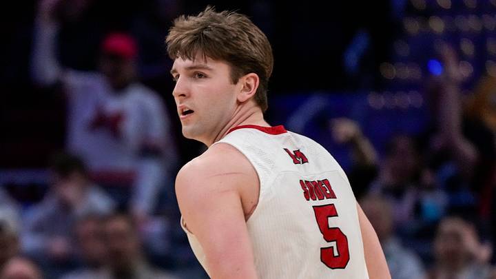 Miami RedHawks guard Peter Suder (5) runs back on defense after a basket in the second half of Mid-American Conference Tournament first round game between the Miami RedHawks and the UMass Minutemen at Rocket Arena in Cleveland on Thursday, March 12, 2026. Top-seeded Miami was eliminated from the tournament with an 87-82 loss to the Minutemen. Miami RedHawks guard Peter Suder (5) runs back on defense after a basket in the second half of Mid-American Conference Tournament first round game between the Miami RedHawks and the UMass Minutemen at Rocket Arena in Cleveland on Thursday, March 12, 2026. Top-seeded Miami was eliminated from the tournament with an 87-82 loss to the Minutemen.